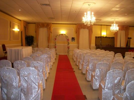 Very pretty set-up for ceremony held in the same room as the reception.