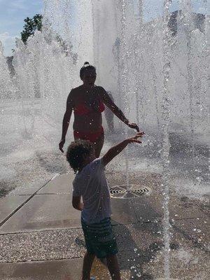 Enjoying a hot day with my grandson.