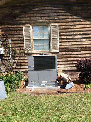 Finishing up a package heat pump system.