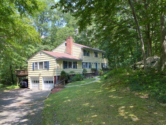 COUNTRY COLONIAL- screened porch & deck view rushing brook. Spacious w/hdwd throughout.