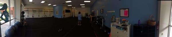 Interior panorama: incredibly spacious! L to R: Medicine Balls, Pull ups, Battle Ropes, Dumbbells, Kettle Bells, Sign-In Area.