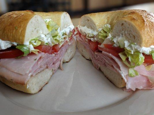 House-made bagel, stuffed with chive cream cheese and smoked ham