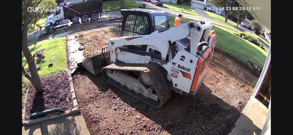 Removing old driveway and never damaged my landscaping.