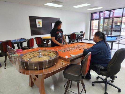 Our roulette table and wheel are regulation size. Practice your spins and pushing your chips