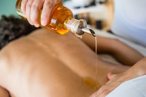 Abhyanga - Ayurvedic warm herbal oil massage.