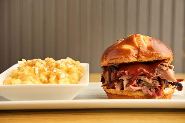 Mr. B's pulled pork sandwich on brioche, with side dish