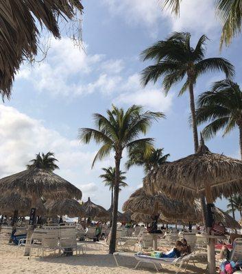 Huts on the beach with chairs and towels $10.00 per day sometimes FREE