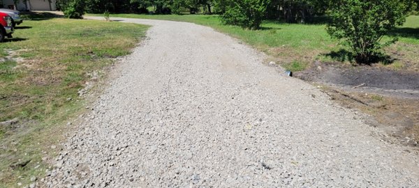 Added rock and graded driveway