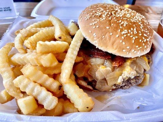 The Cess-nator- 12oz beef burger, bacon, sautéed onions, and cheddar cheese plus crinkle cut fries - about $15, huge burger!