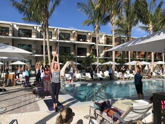 Yoga around the pool at the Perry Hotel!