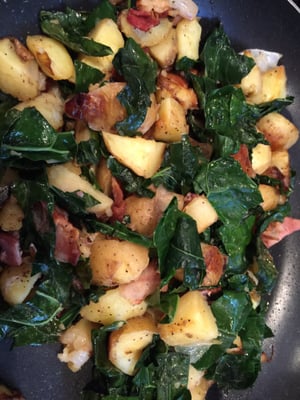 Potato hash made with lacinato kale and onions purchased at the market