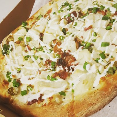 Loaded Potato Pizza (made with real Idaho potatoes, crisp bacon, fresh herbs,and spices jalopenos