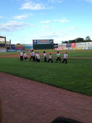 The Dance Place boys dancing at a L I Ducks game