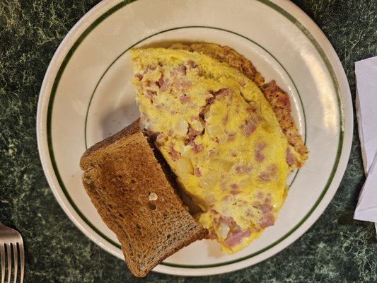 Western omlette with American cheese.  Whole wheat toast.