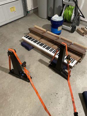 Repaired legs drying in my "shop" - PSA: I do not recommend people work on their pianos like this... call a professional!