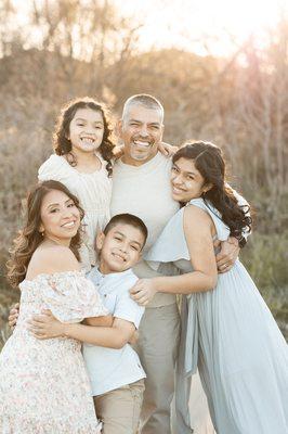 Outdoor family pictures, at sunset, in our privately leased field.