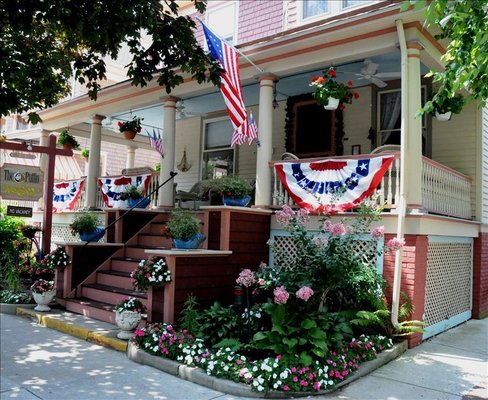 Cape May Holly Suites large victorian front porch.