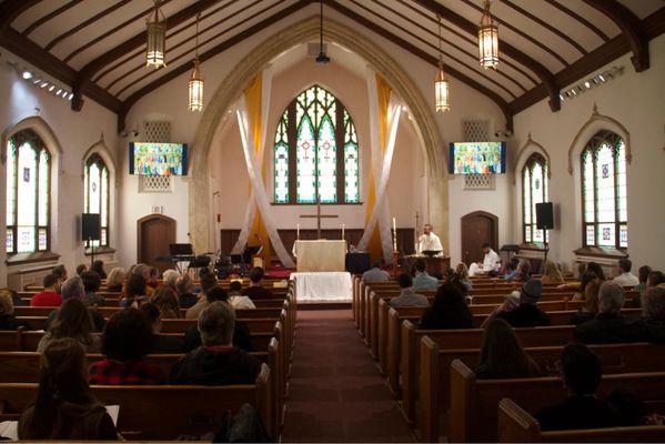 Looking towards the altar from the back where the sound for livestreams are done.