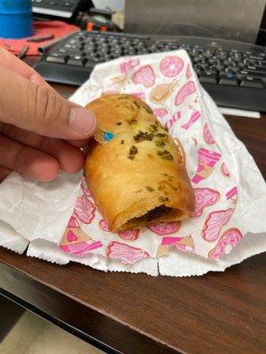 Blue plastic in the breading and what looks like two day-old sausage.