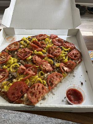 Veggie pizza (tomato, mushroom, banana pepper, onion) but we should have gotten more sauce to dip it in