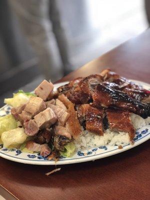 Roasted duck and pork with rice and vegetables