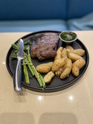 Skirt steak with chimichurri, fingerling potatoes, & broccoli rabe