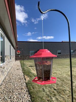 Bird feeders outside Extended Care Resident windows at North Platte Valley Medical Center in Saratoga, WY