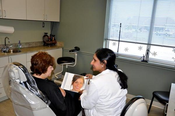 Dentist explaining smile makeover options at Beautiful Dentistry Mocksville NC