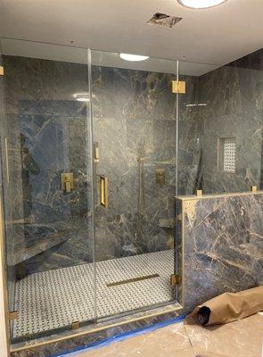 This three piece shower includes Satin Brass