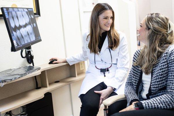 Dr. Serrano and a patient during a consultation