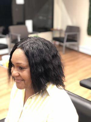 Middle part weave style at 291 Salem
Street Medford Ma at Josee's braiding Salon.