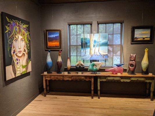 Paintings by Lydia Hesse and Craig Freeman, and glass by Peter Wright