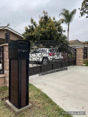 Check out our beautiful custom ornamental scroll gate paired with our modern mailboxes. Available now