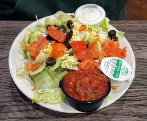 Taco salad with salsa, ranch and sour cream, minus the ground beef