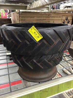 Tractor tires and rim ceramic planter pot... Hilarious!