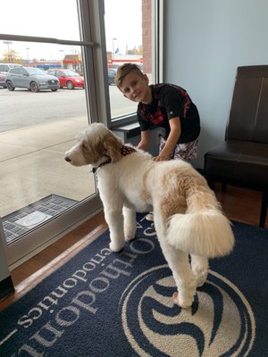 My 9 yr old with Bandit, the therapy dog.