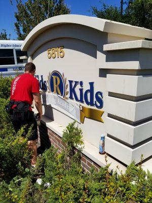 Refacing old Vinyl to New on Kids R Kids monument sign. Print & Installation