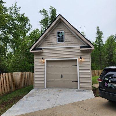 New one-car garage with attic storage space