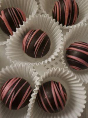 Raspberry dark chocolate truffles with a creamy filling.