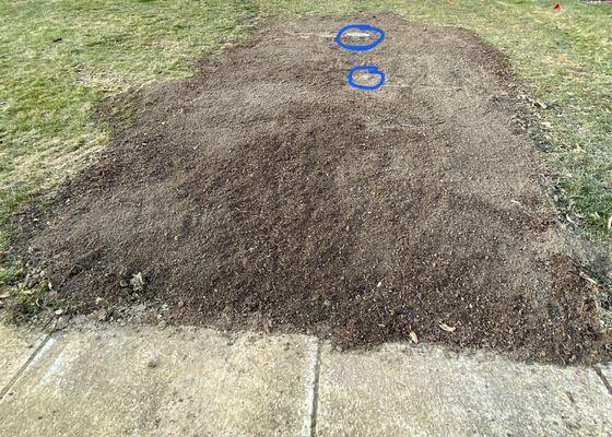 Finished dry well (pipes/grate circled in blue)