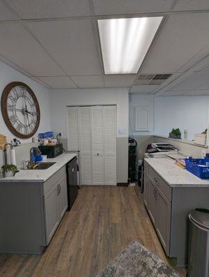 Mini fridge cleaned out, countertops organized and wiped down.