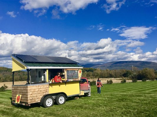 Solar powered cart serving on a scenic lawn