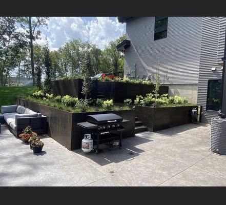 Corten steel wall and steps installation in partnership with Timberland Outdoor Services