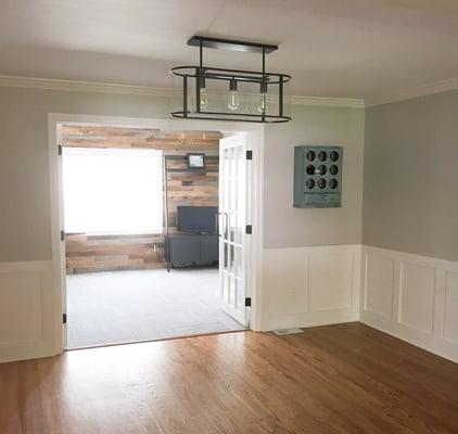 Wainscoting in dining rom and reclaimed wood wall