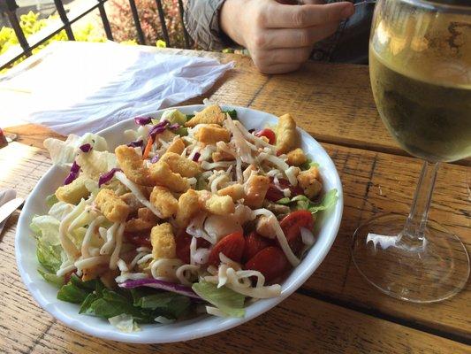 Grilled chicken salad and glass of Seyval Blanc