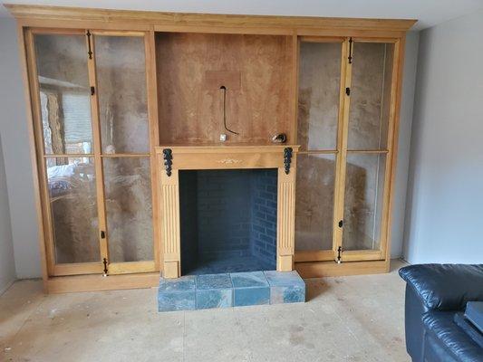 Built-in bookcase with Fireplace Surround built @frankscustomfurniture