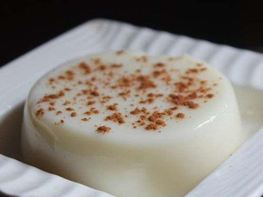 Tembleque: Coconut pudding sprinkled with cinnamon