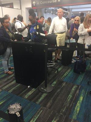 One TSA agent at checkpoint ..understaffed on peak travel sunday evening!