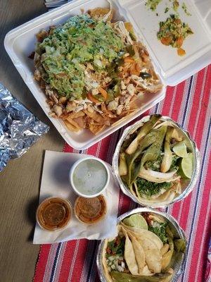 Chicken nachos, Steak Tacos and Al pastor tacos