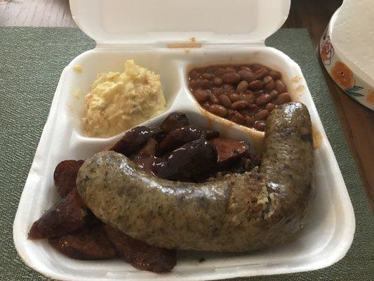 Potato salad, ranch beans, sausage, beef brisket, pork ribs, boudin.